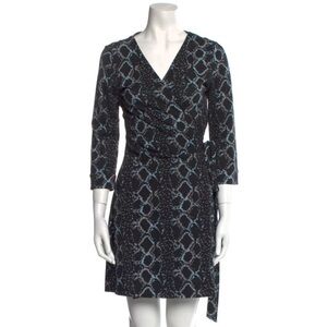 Diane Von Furstenberg Wrap Dress
Size 6 silk black snake python print